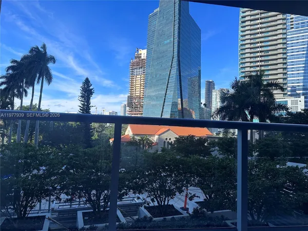 a view of swimming pool from a balcony