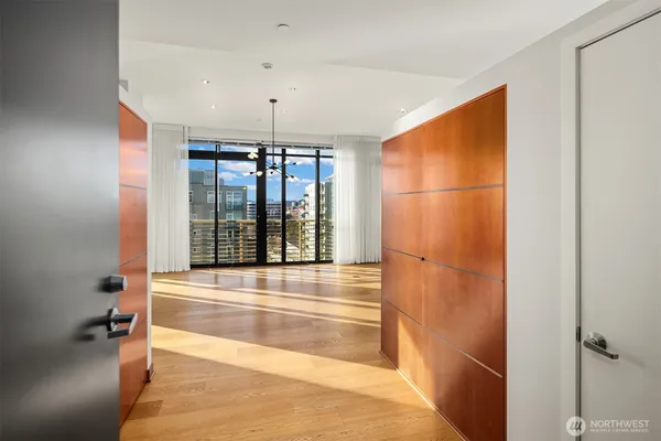 a view of a bathroom with a tub and shower