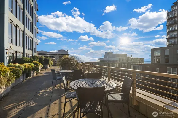 a view of a terrace with sitting area