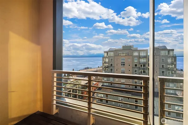 a view of a balcony with wooden floor