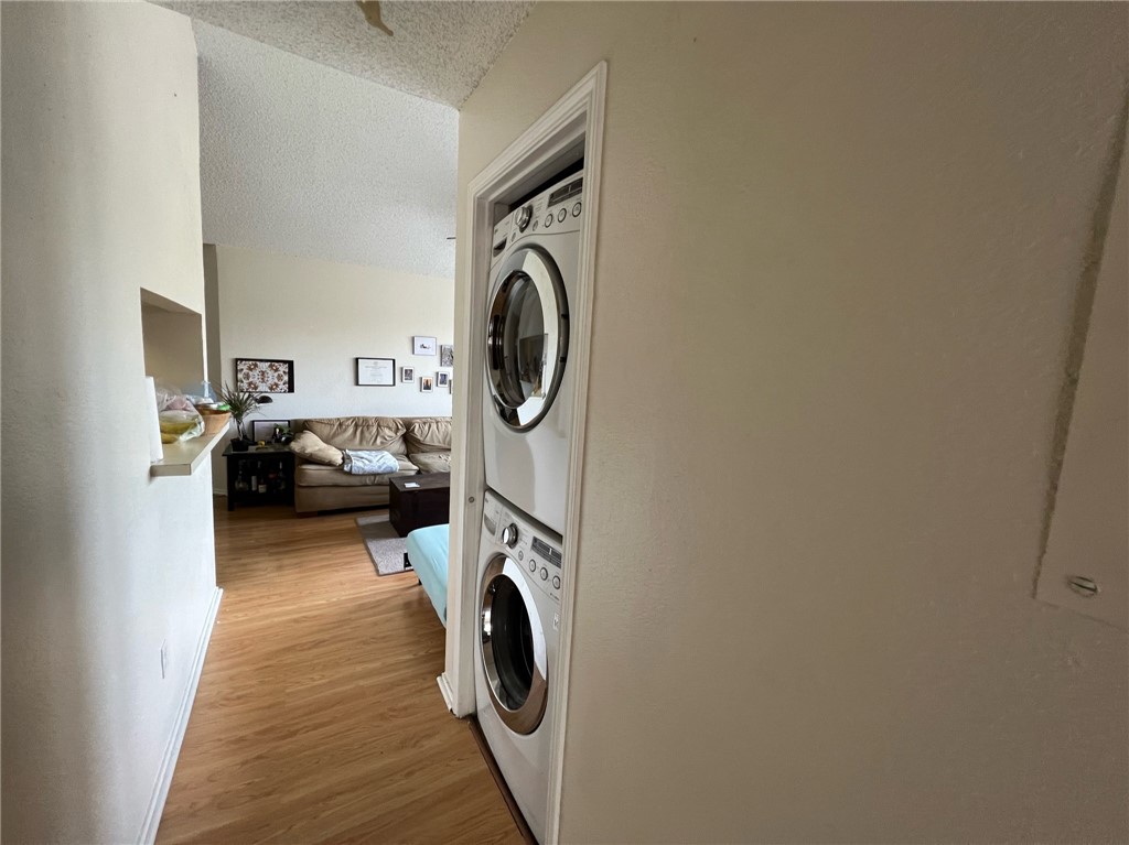 2706 Salado Street, Unit 302 Austin, TX 78705 - Photo 6 of 10 a utility room with dryer and washer