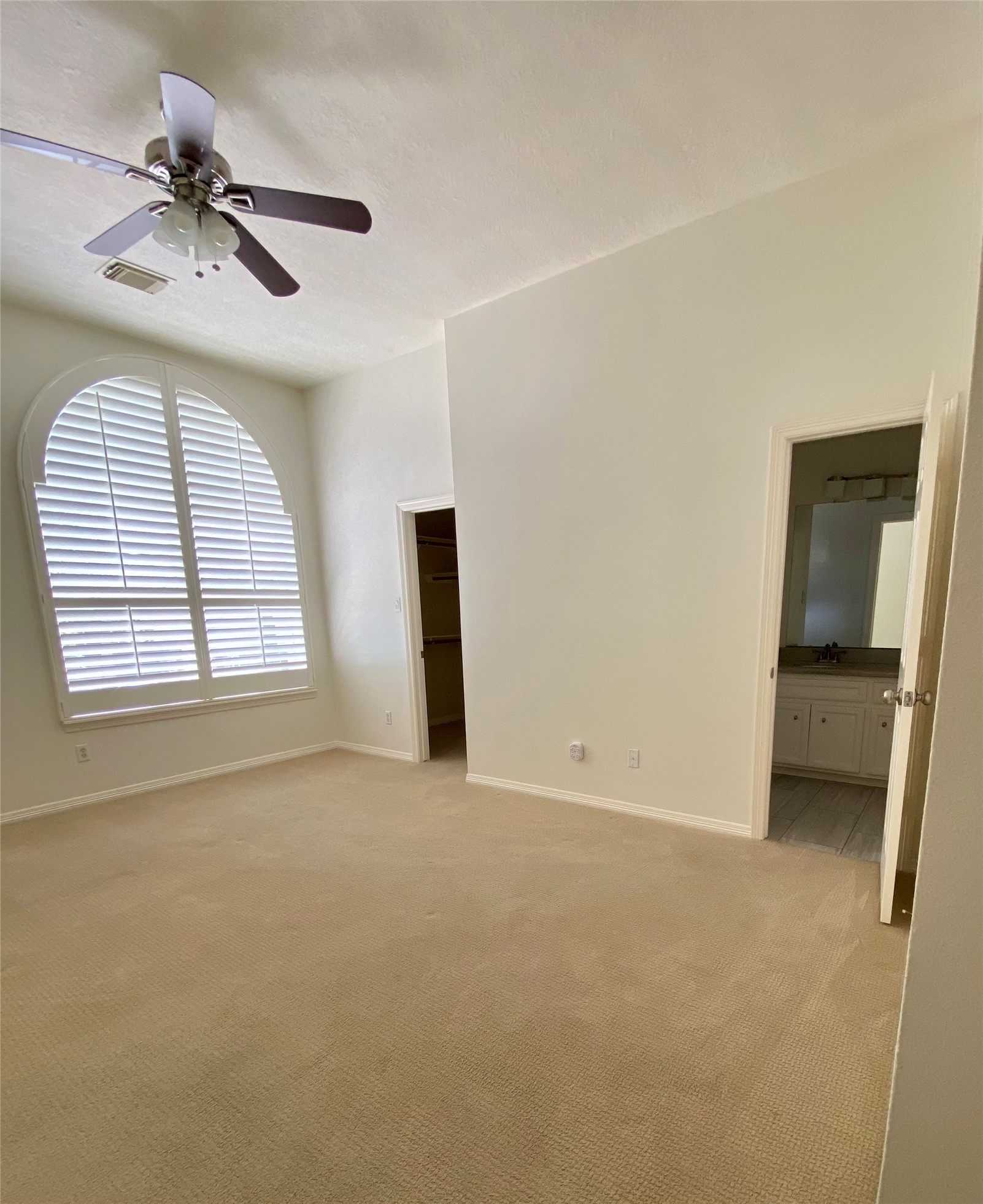4916 Maxie Street Houston, TX 77007 - Photo 2 of 8 a view of an empty room with a window