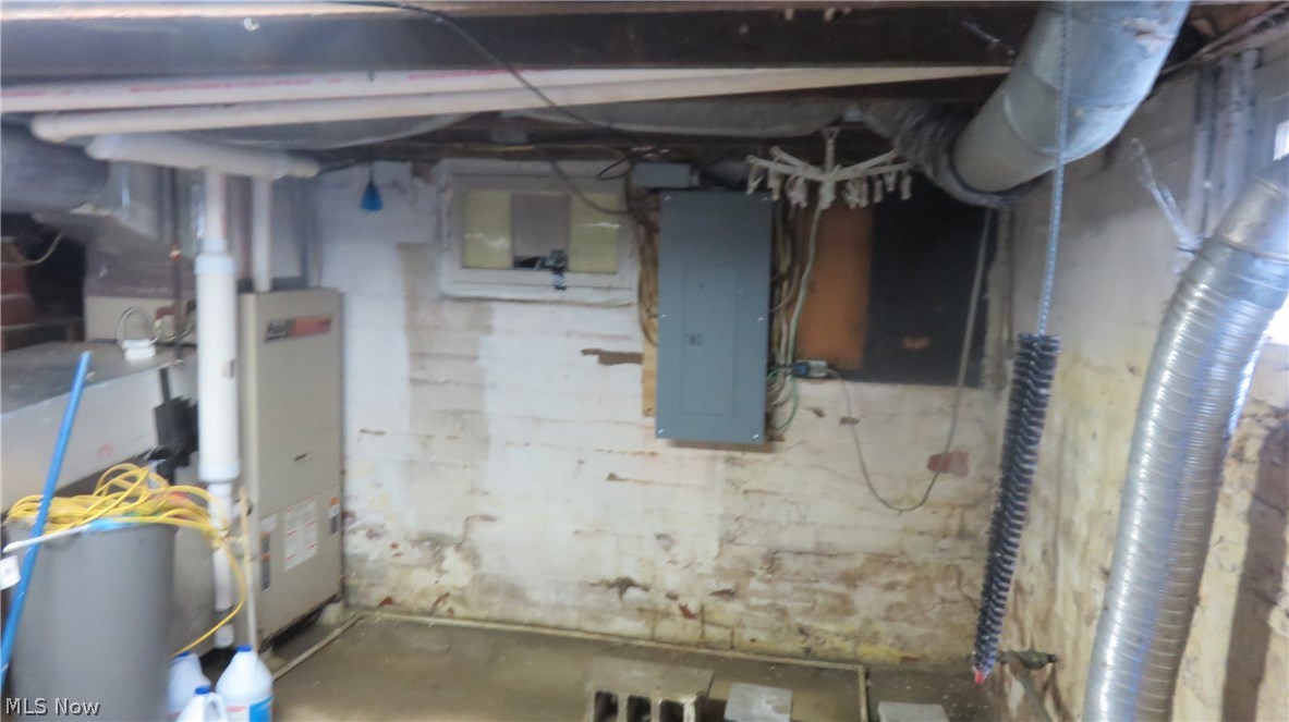 21259 Quarry Road Wellington, OH 44090 - Photo 21 of 30 Cellar houses furnace, electric panel, hot water tank and laundry area.