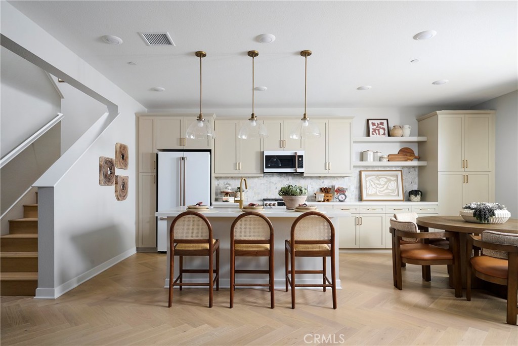 1751 Scarlett Road Rancho Mission Viejo, CA 92694 - Photo 5 of 14 Model Photos: Photos shown are of the model home for this floor plan. Actual finishes, features, and landscaping may vary.