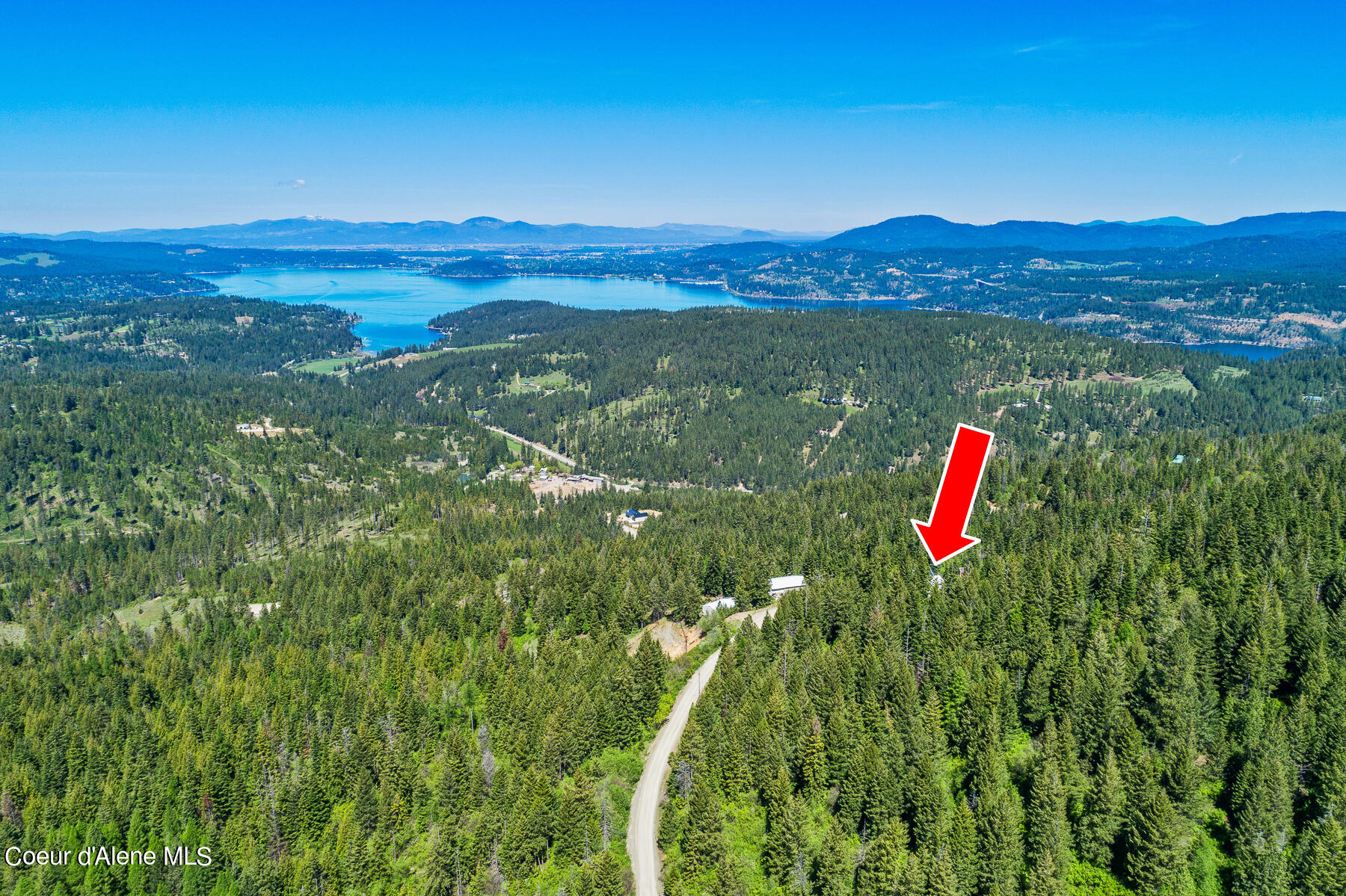 9338 South Caribou Ridge Road Harrison, ID 83833 - Photo 3 of 45 Aerial_9338SCaribouRidgeRd-4_Arrow