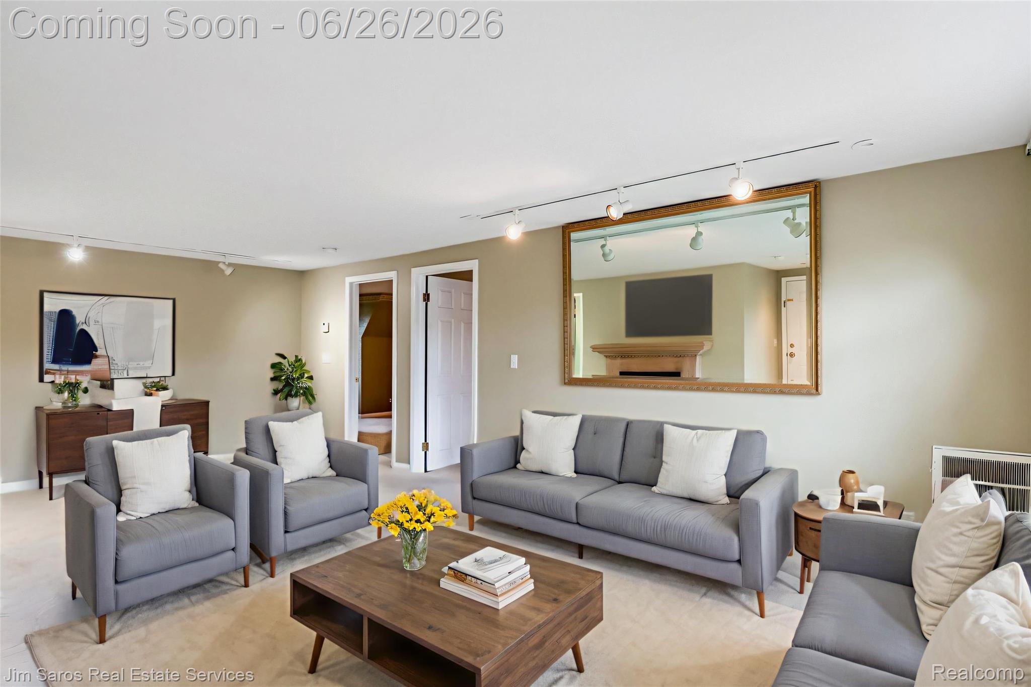764 Harcourt Road Grosse Pointe, MI 48230 - Photo 28 of 42 Spacious room featuring neutral wall tones, recessed lighting, track lighting, and a large framed mirror