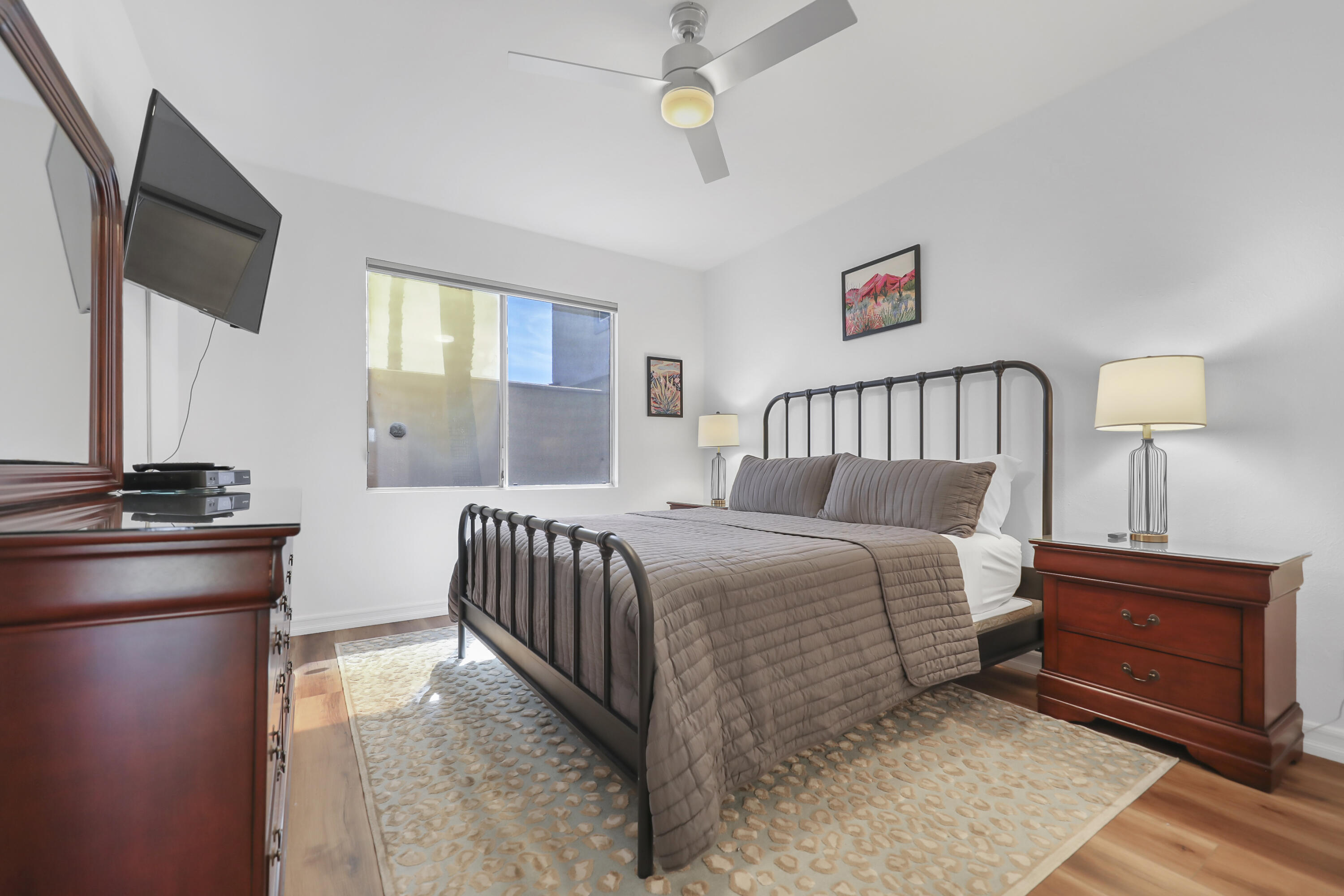 55359 Winged Foot La Quinta, CA 92253 - Photo 15 of 22 a bedroom with a bed and a flat screen tv