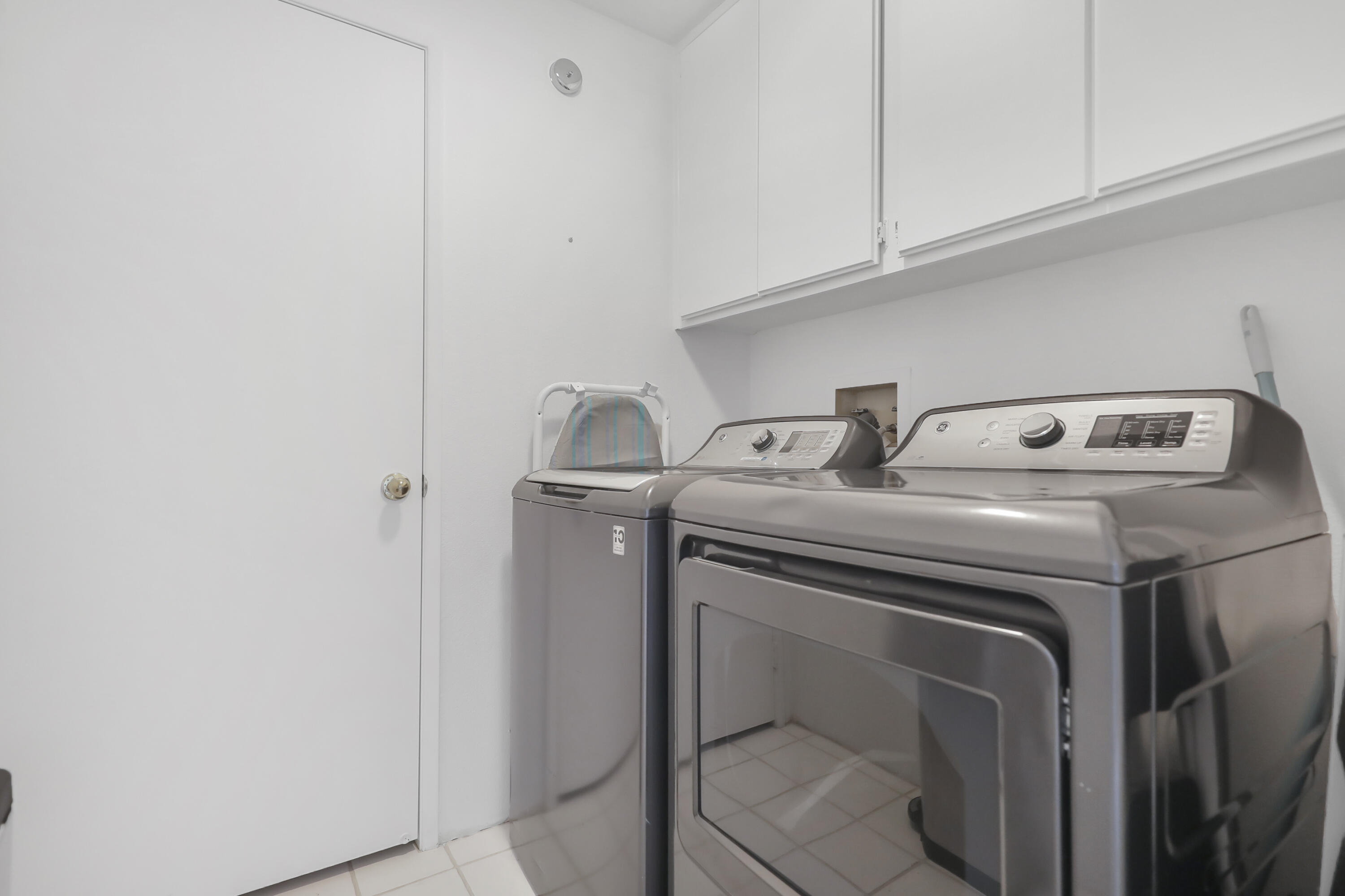 55359 Winged Foot La Quinta, CA 92253 - Photo 22 of 22 a utility room with dryer and washer