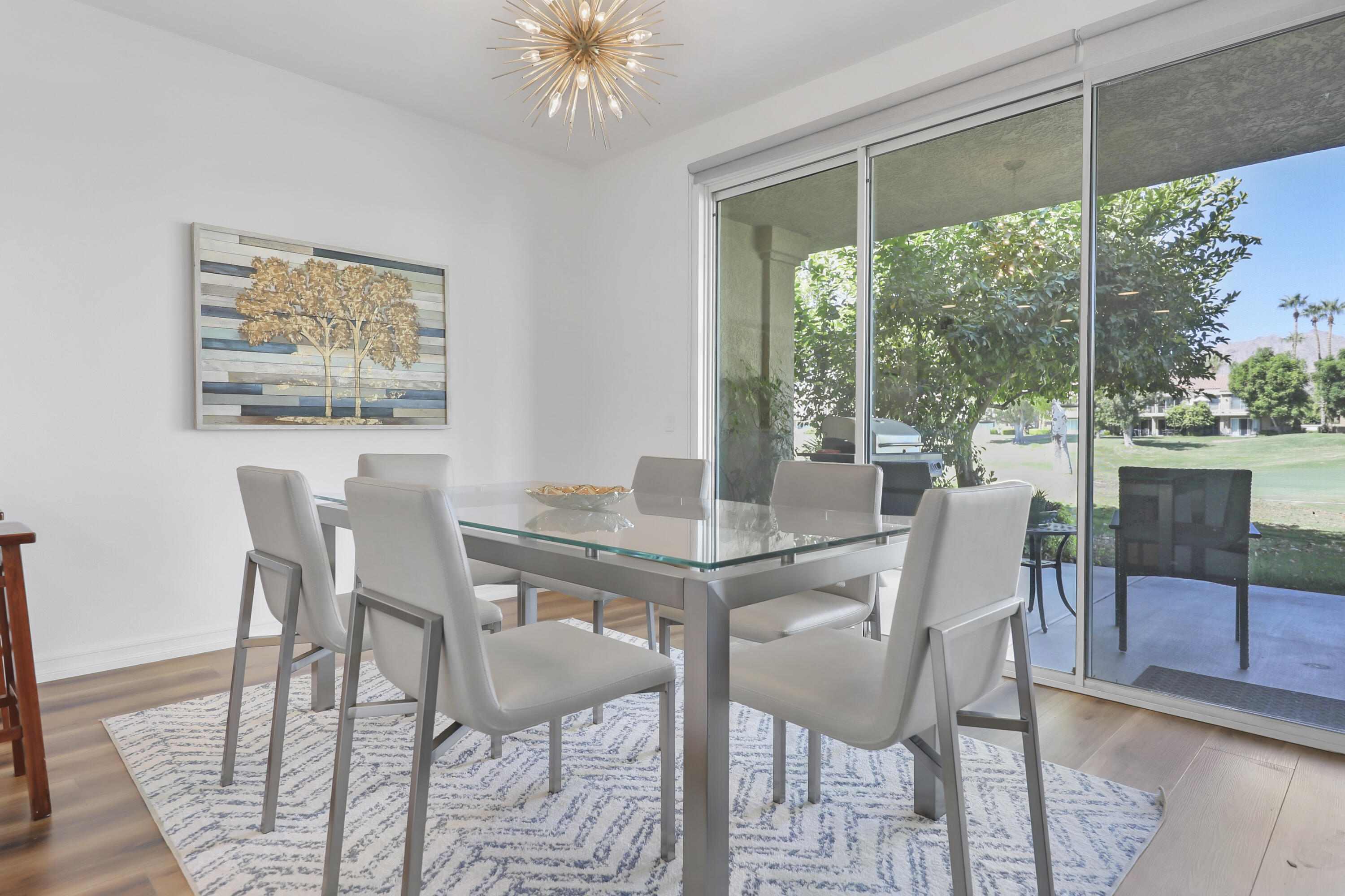 55359 Winged Foot La Quinta, CA 92253 - Photo 8 of 22 a view of a dining room with furniture window and outside view