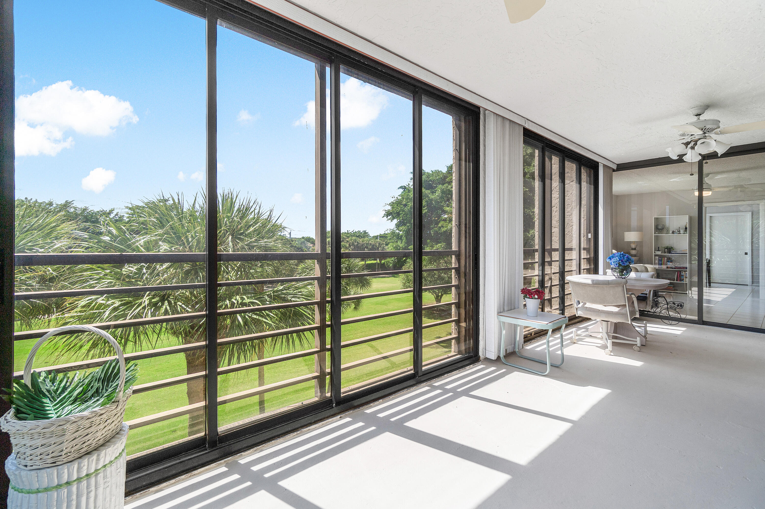 7572 Regency Lake Drive, Unit 401 Boca Raton, FL 33433 - Photo 12 of 28 a building outdoor space with seating space