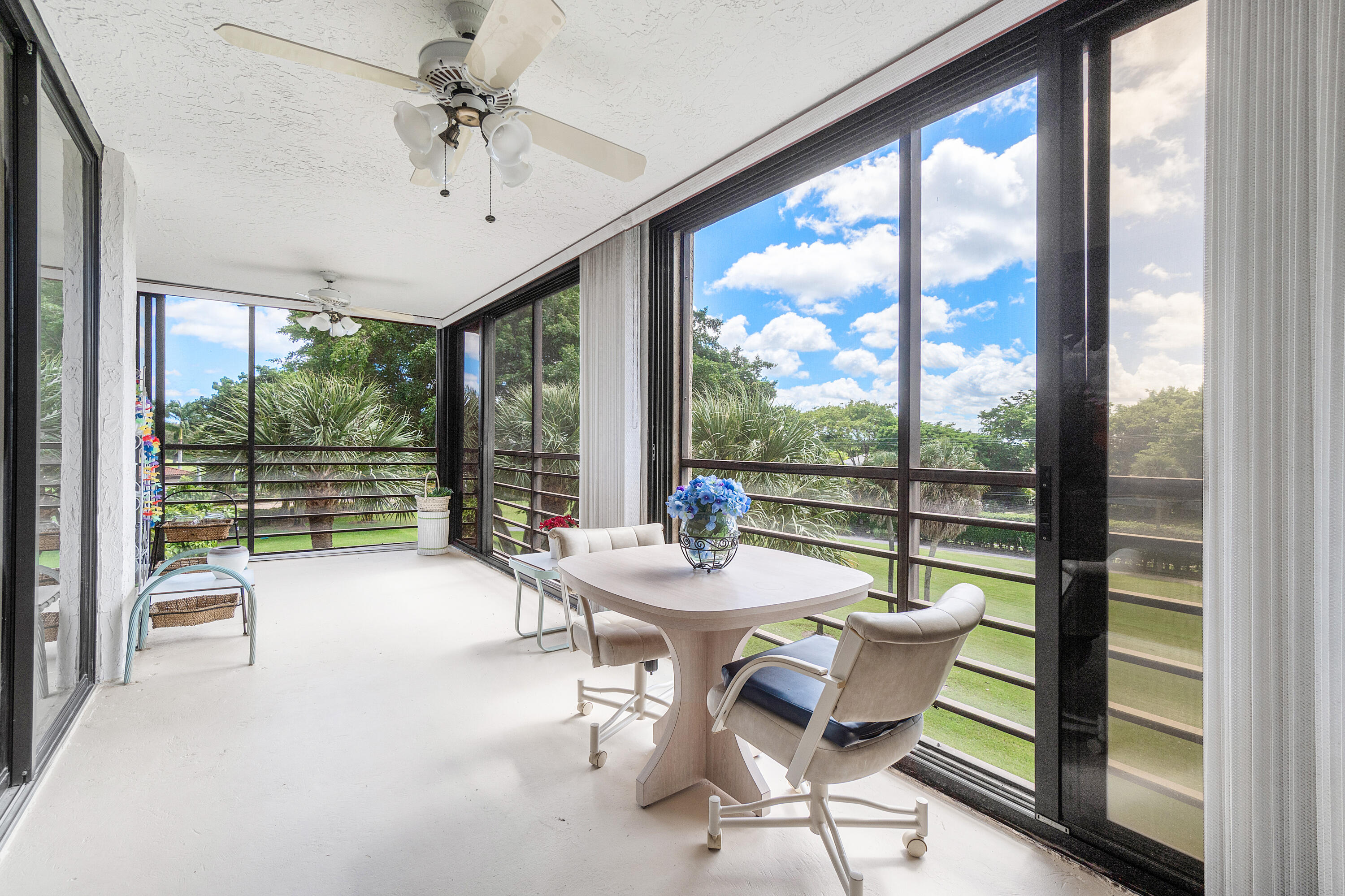 7572 Regency Lake Drive, Unit 401 Boca Raton, FL 33433 - Photo 14 of 28 a room with pool table and chairs