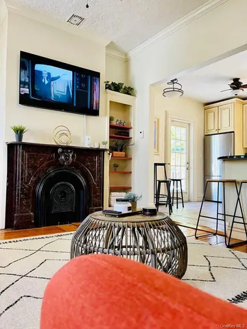 a bedroom with a bed and a fireplace