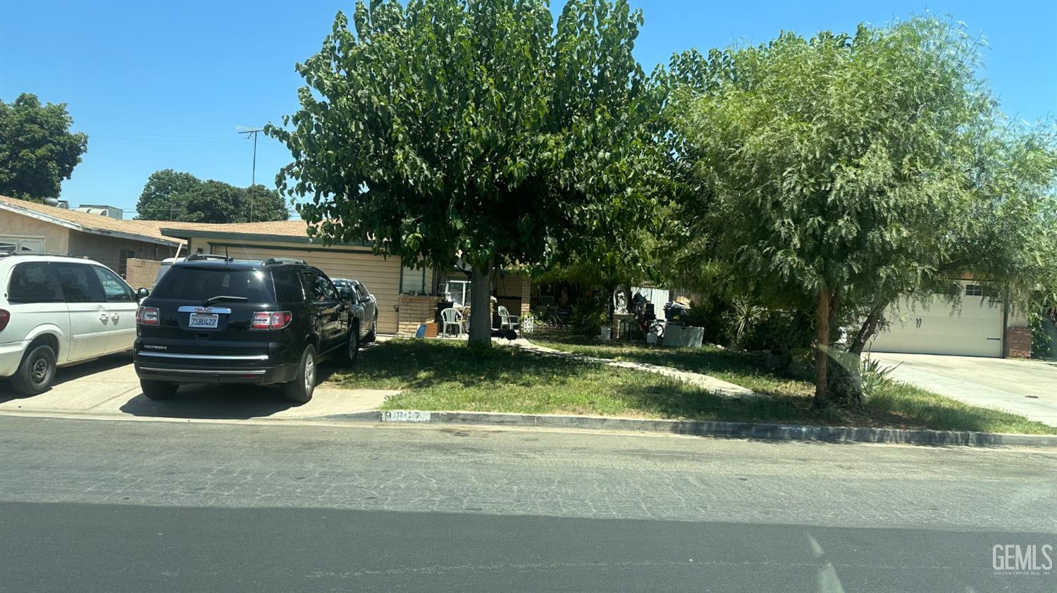 Undisclosed Address Lamont, CA 93241 - Photo 1 of 3 a view of a house with a back yard