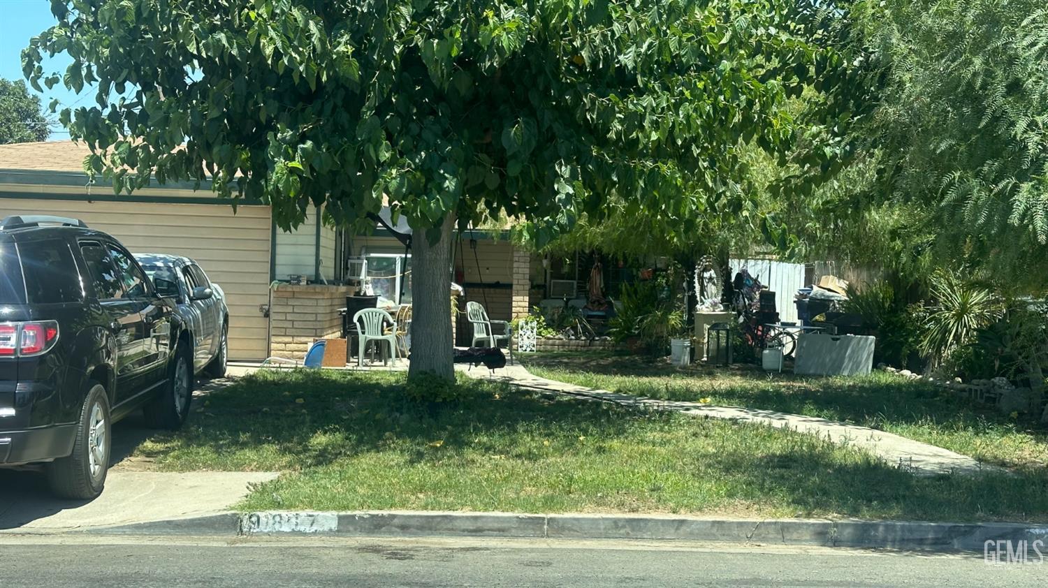 Undisclosed Address Lamont, CA 93241 - Photo 2 of 3 a view of a backyard