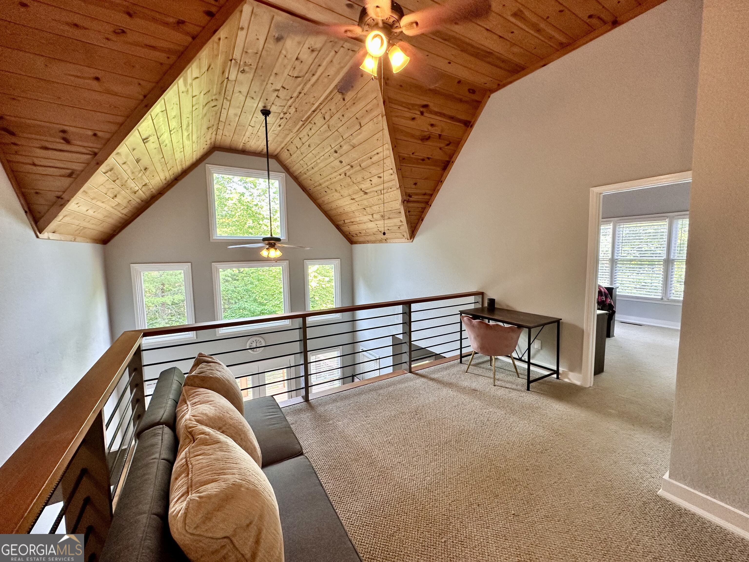 2769 Bean Creek Road Sautee Nacoochee, GA 30571 - Photo 8 of 33 a view of livingroom with furniture and staircase