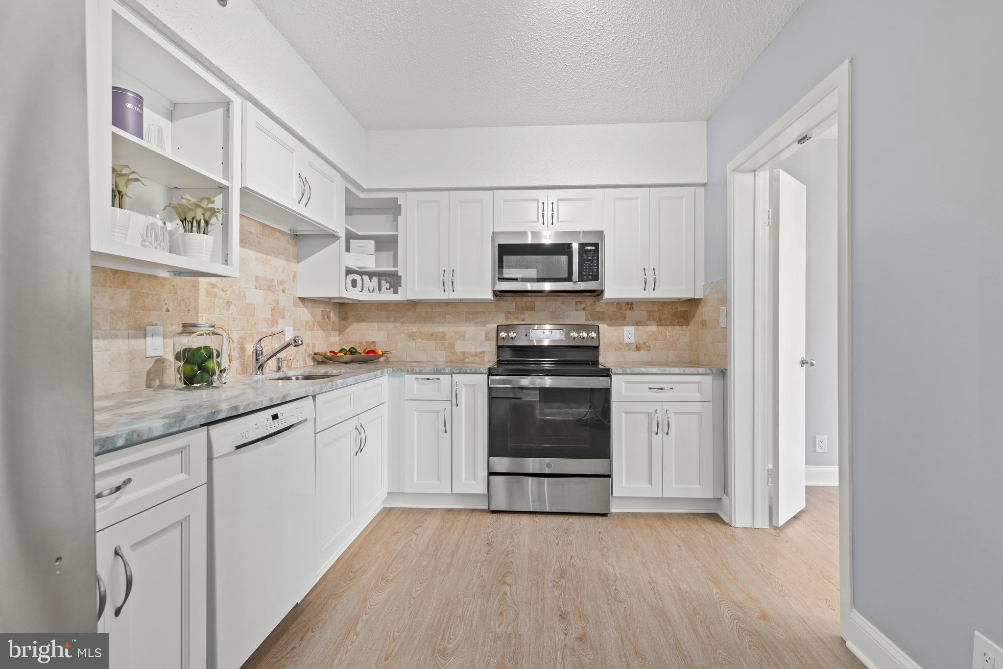 5505 Seminary Road, Unit 406N Falls Church, VA 22041 - Photo 4 of 35 Matching Stone backsplash