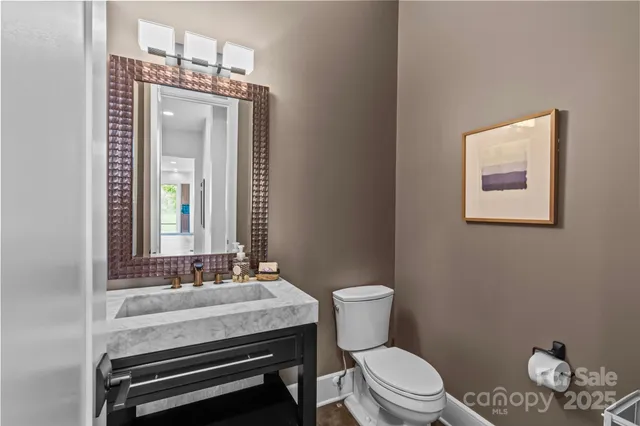 a bedroom with a bed couch and window