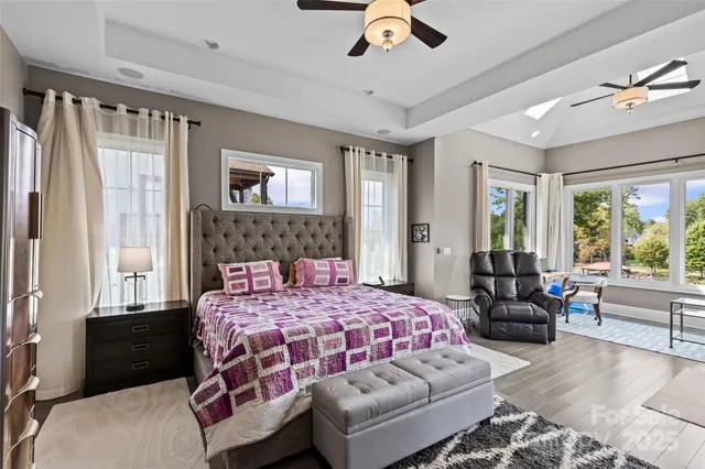 a bedroom with furniture or couch and a fireplace