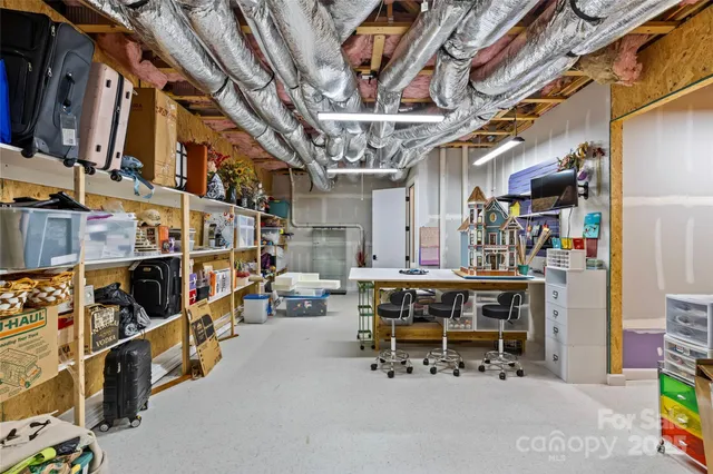 a view of a lake with a house in the background