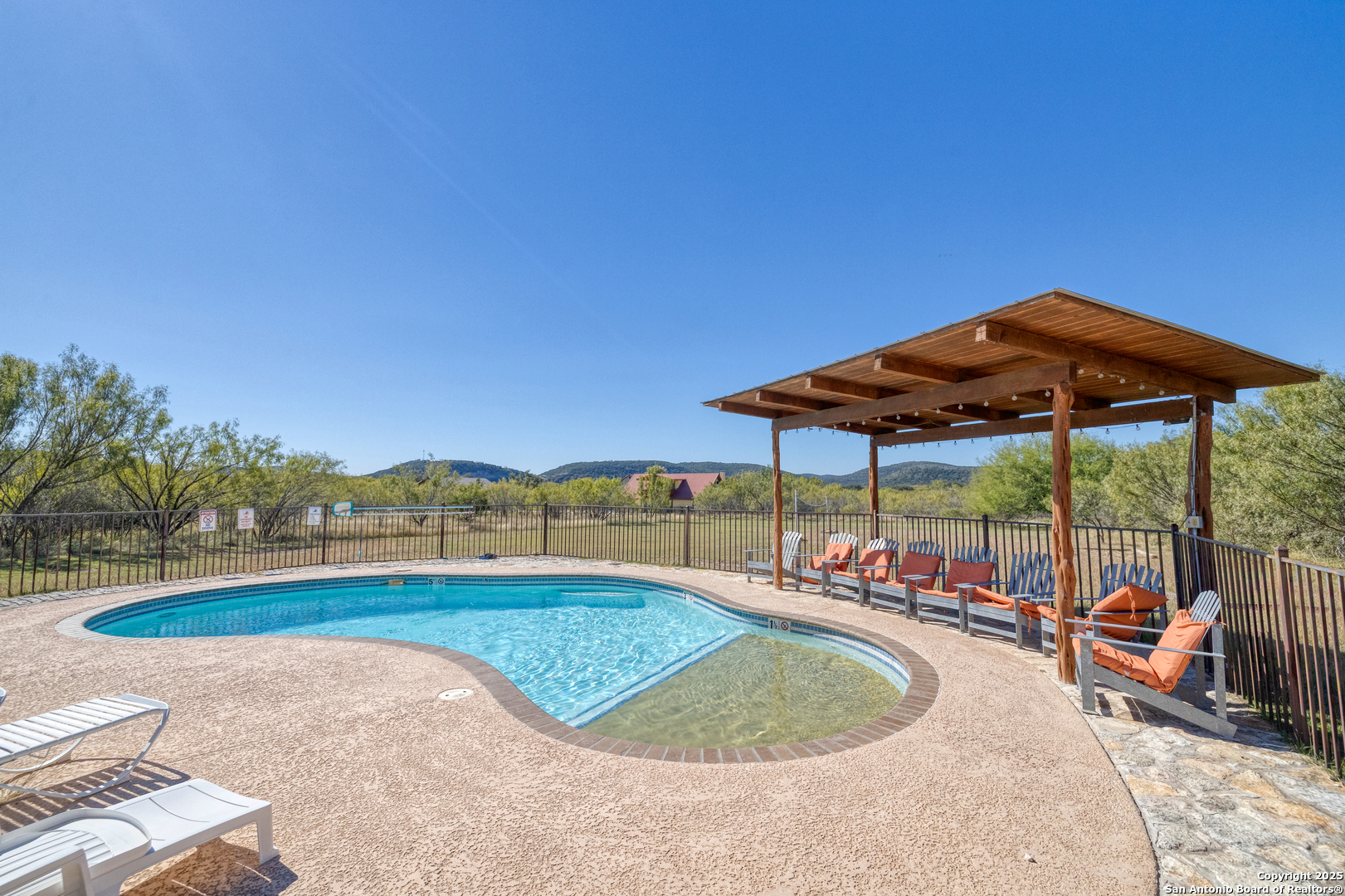 38 Mountain Laurel Lane Concan, TX 78838 - Photo 14 of 48 a view of outdoor space swimming pool and patio