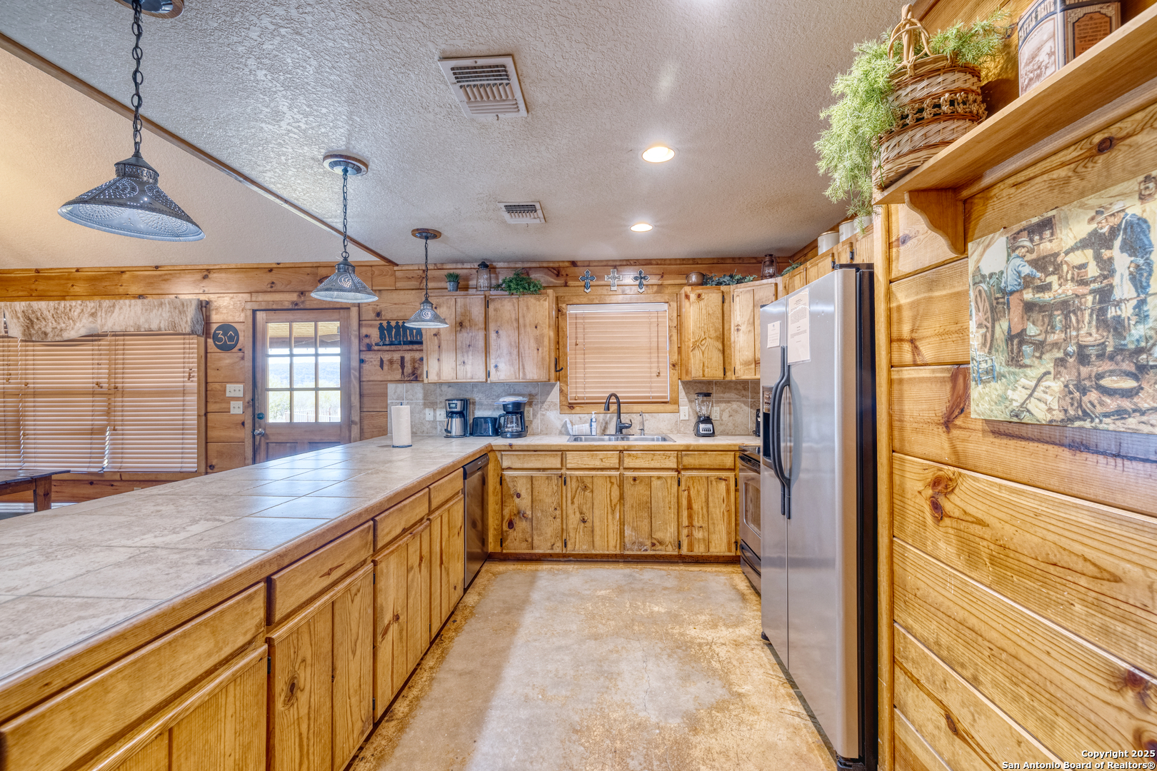 38 Mountain Laurel Lane Concan, TX 78838 - Photo 28 of 48 a view of a kitchen with kitchen
