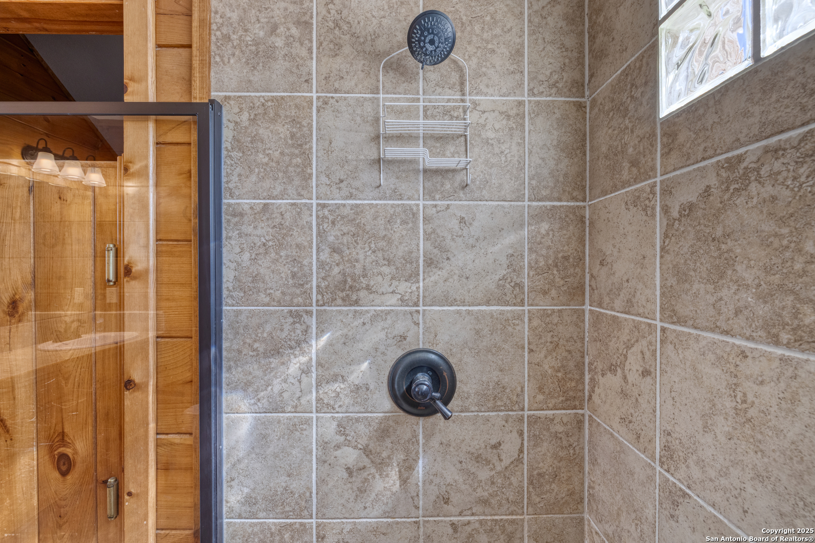 38 Mountain Laurel Lane Concan, TX 78838 - Photo 36 of 48 a bathroom with a shower