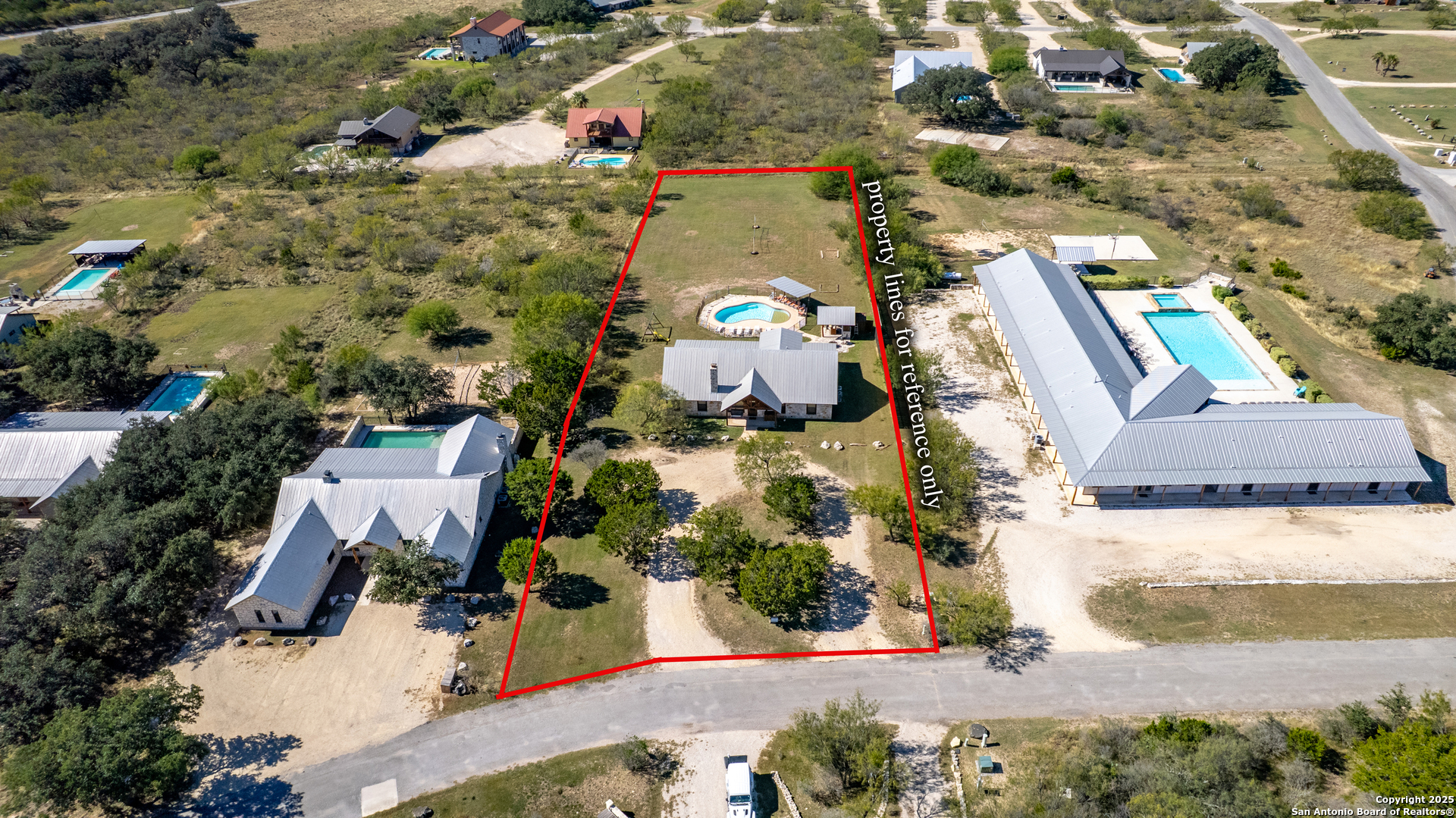 38 Mountain Laurel Lane Concan, TX 78838 - Photo 41 of 48 an aerial view of residential houses with outdoor space
