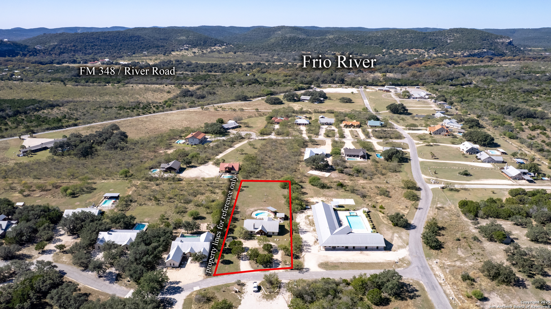 38 Mountain Laurel Lane Concan, TX 78838 - Photo 42 of 48 a view of a lake with a mountain