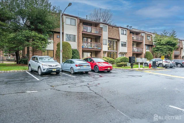 a cars parked in front of a building
