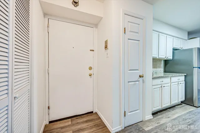 a kitchen with appliances and cabinets
