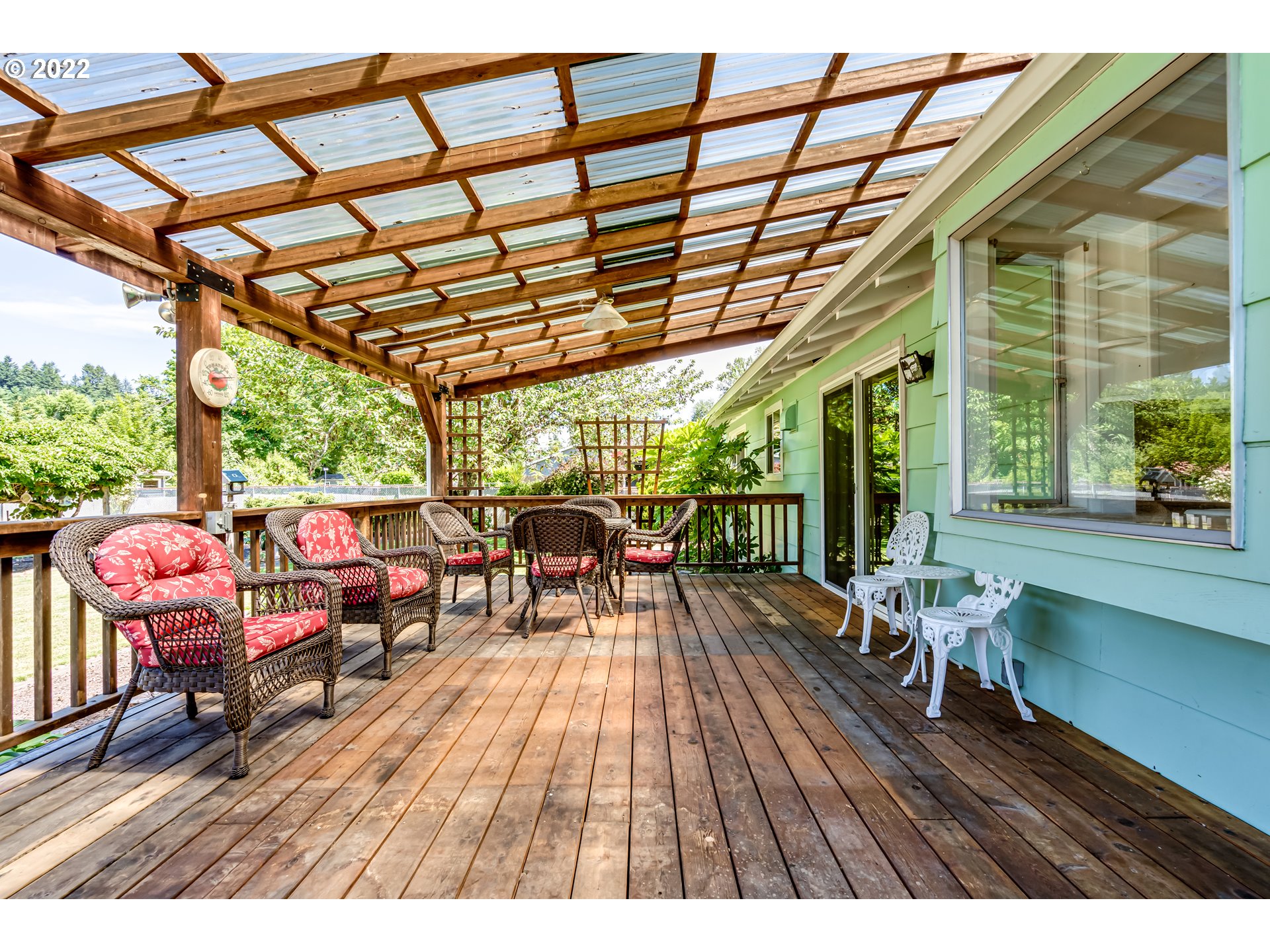 37833 Camp Creek Road Springfield, OR 97478 - Photo 14 of 32 a view of a patio with wooden floor