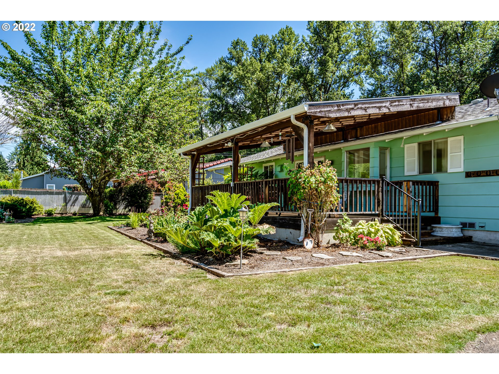 37833 Camp Creek Road Springfield, OR 97478 - Photo 16 of 32 a backyard of a house with yard and outdoor seating