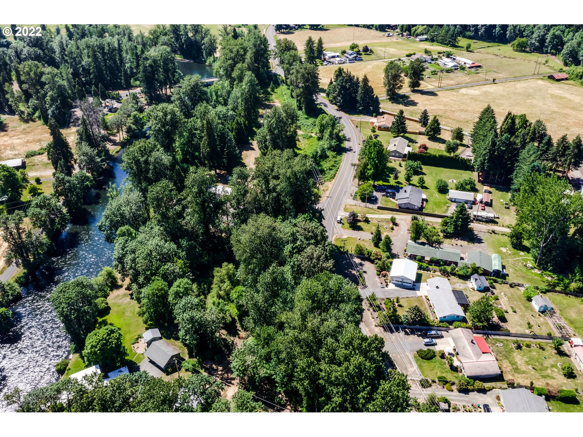 37833 Camp Creek Road Springfield, OR 97478 - Photo 30 of 32 an aerial view of residential houses with outdoor space and trees