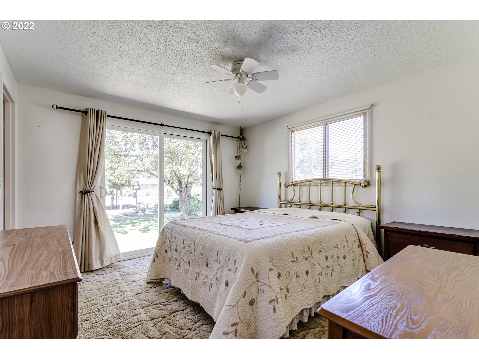 37833 Camp Creek Road Springfield, OR 97478 - Photo 10 of 32 a bedroom with a bed and a large window