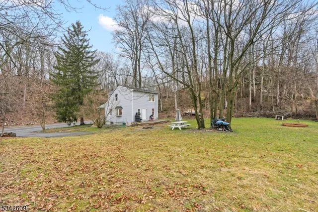a house with trees in front of it