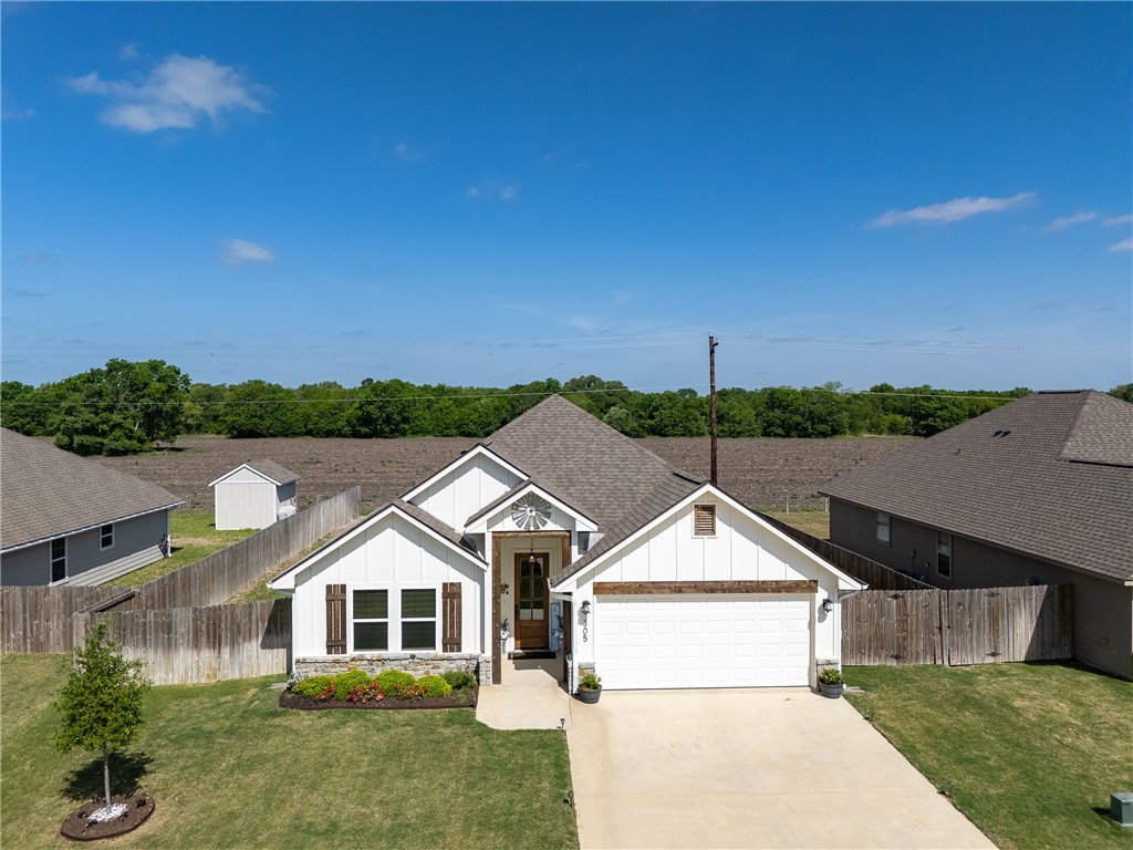 a view of house with outdoor space and street view