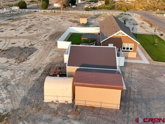 a view of house with outdoor space and swimming pool