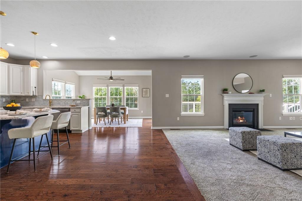 174 Cimarron Drive Coraopolis, PA 15108 - Photo 11 of 50 a living room with furniture and a fireplace