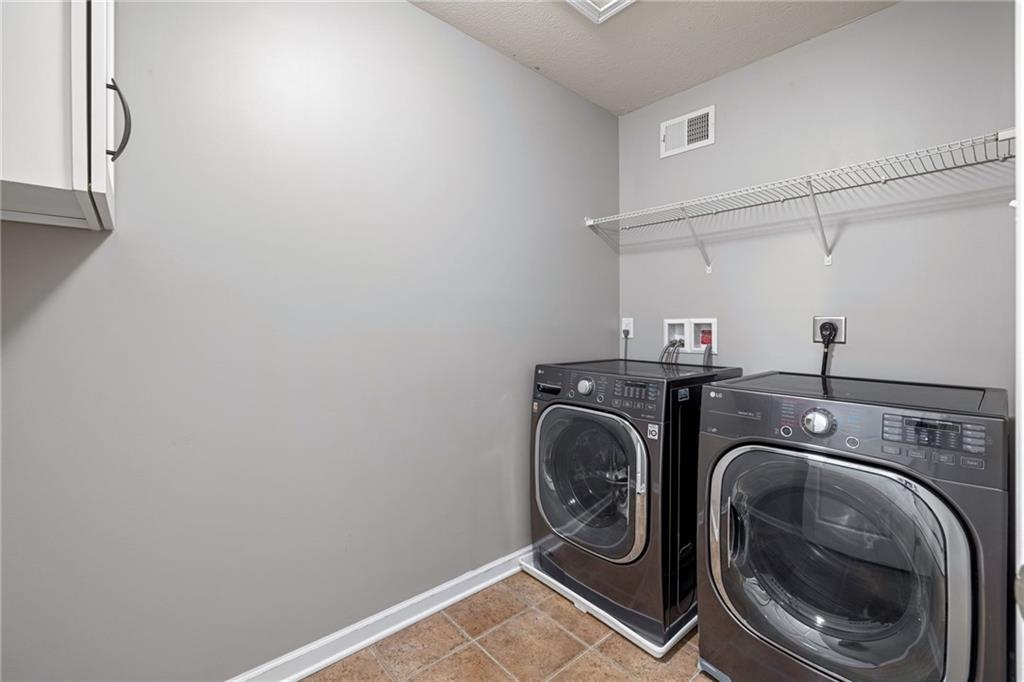 174 Cimarron Drive Coraopolis, PA 15108 - Photo 39 of 50 a utility room with dryer and washer