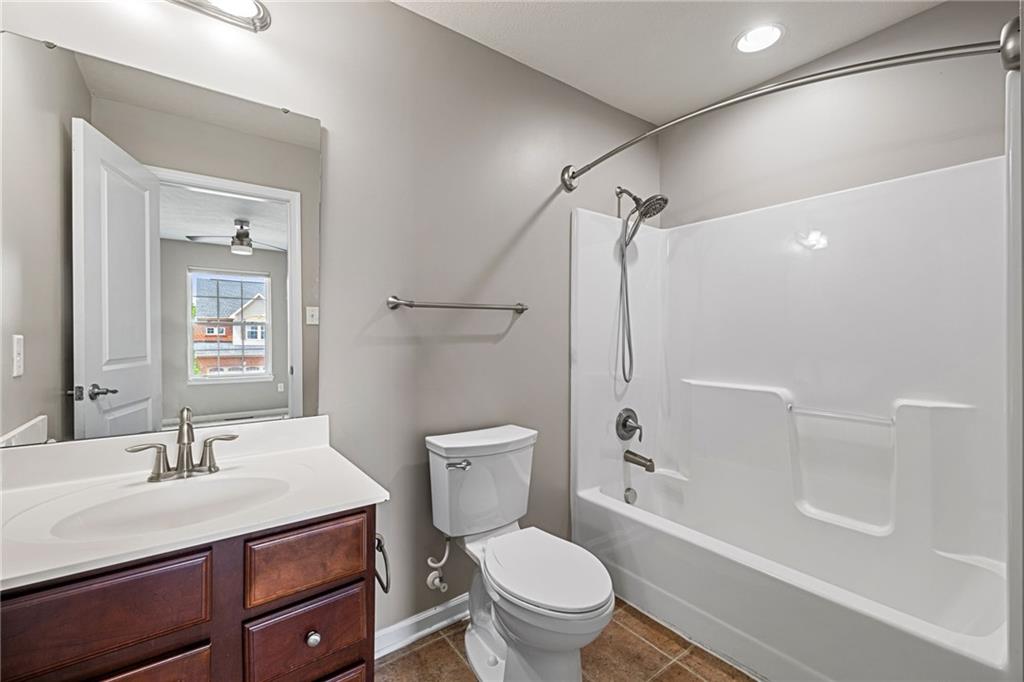 174 Cimarron Drive Coraopolis, PA 15108 - Photo 42 of 50 a bathroom with a sink toilet vanity and shower