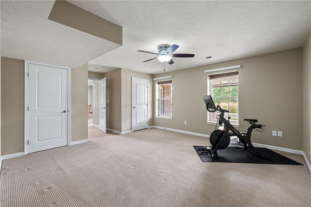 174 Cimarron Drive Coraopolis, PA 15108 - Photo 47 of 50 a view of a livingroom with a chandelier furniture and windows