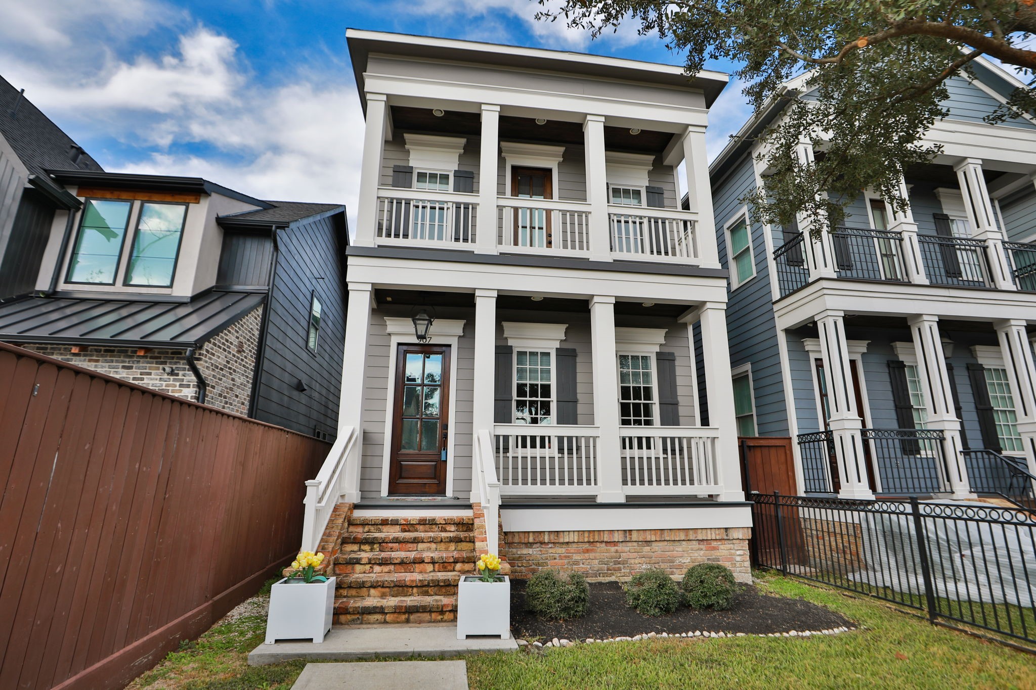Sophisticated, New Orleans style home located in Sunset Heights with large front yard.