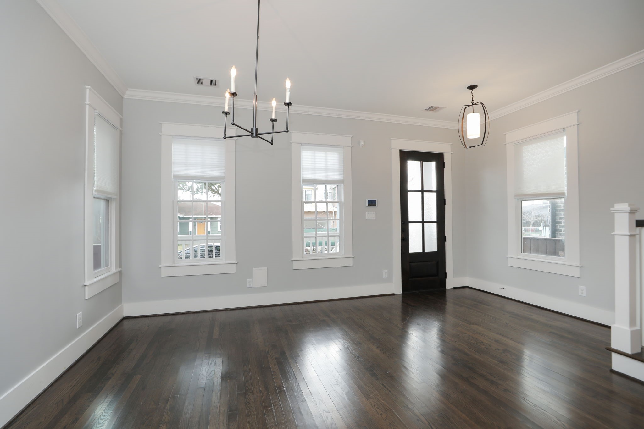 907 East 25th Street Houston, TX 77009 - Photo 32 of 32 GREAT floor plan offers an open concept design with spacious dining room and lots of windows, hardwood floors and beautiful crown molding.