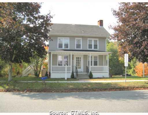8 Westbrook Road Essex, CT 06409 - Photo 1 of 1 a front view of a house with a yard