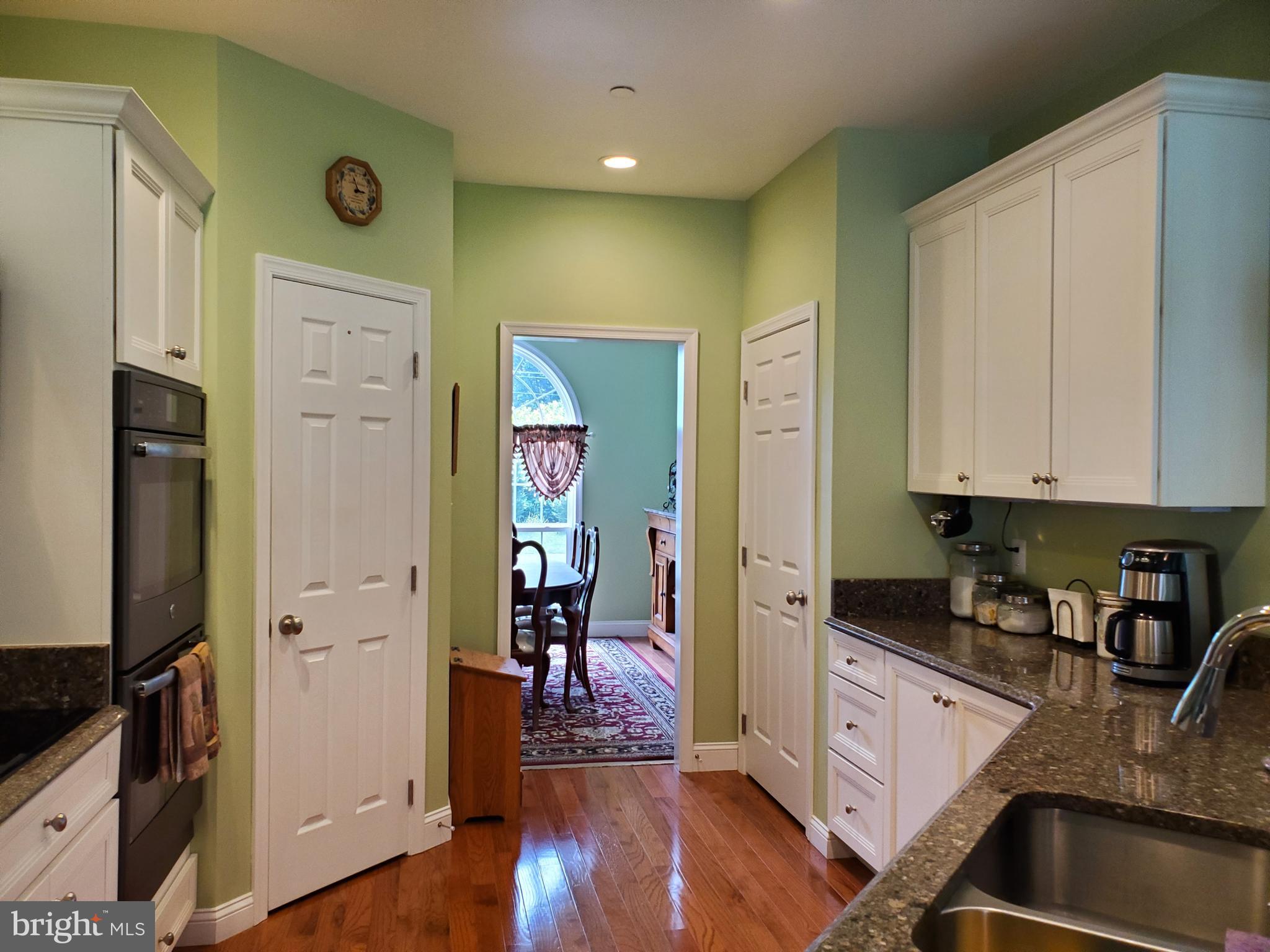 7520 Broomes Island Road St. Leonard, MD 20685 - Photo 7 of 35 Kitchen with upgraded appliances hardwood floors