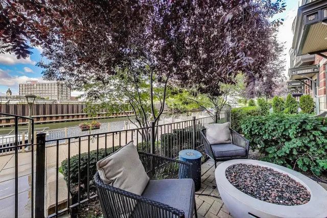 a view of balcony with furniture
