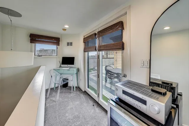 a view of a chairs on the deck