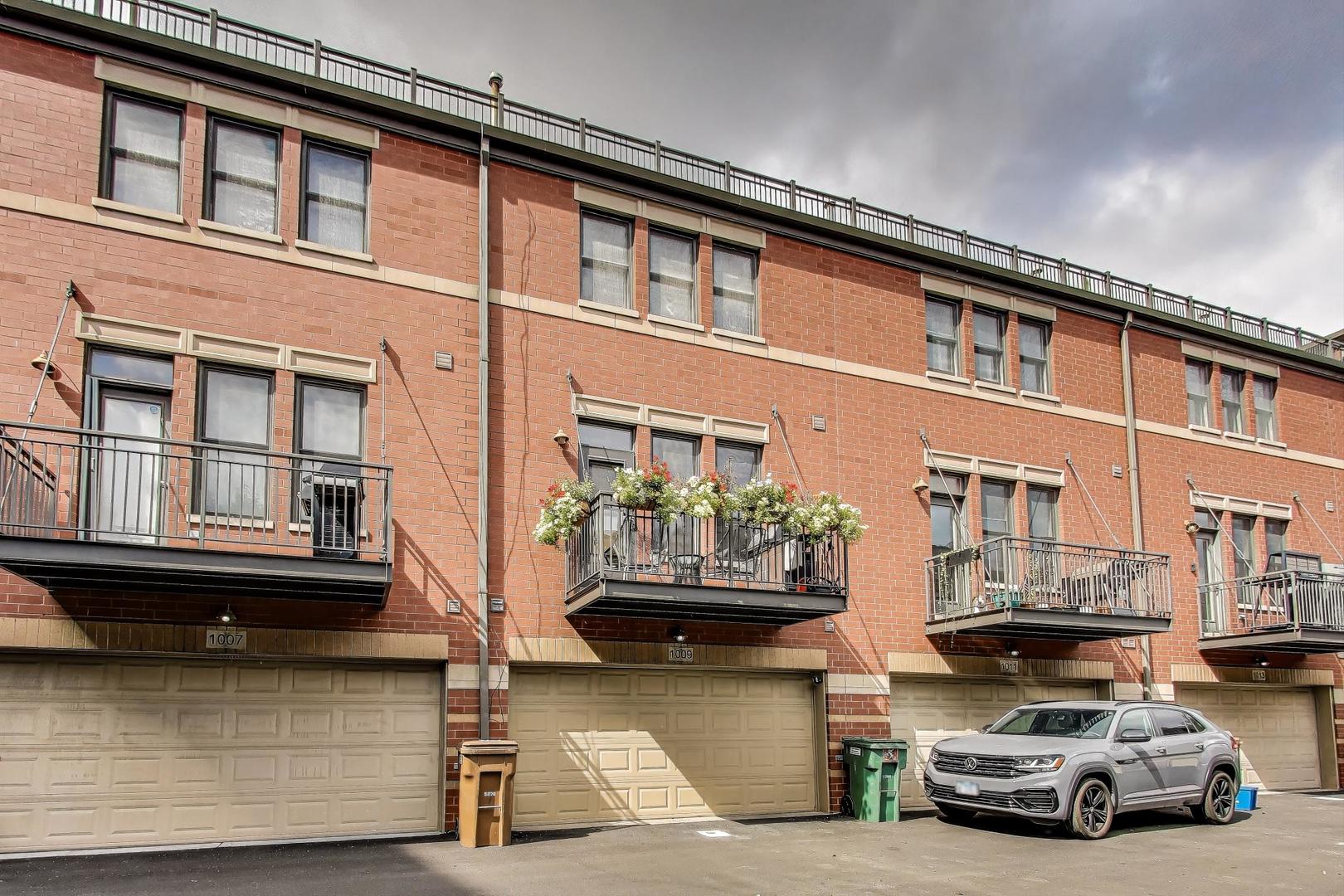 1009 North Riverwalk Street Chicago, IL 60610 - Photo 31 of 39 a car parked in front of a building
