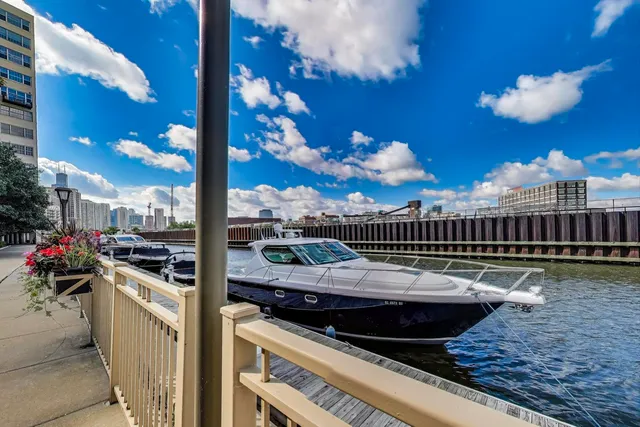 a view of a brick building next to a yard