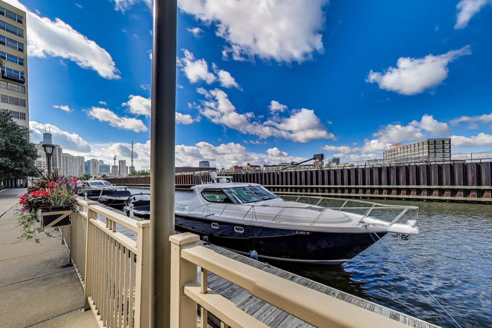 1009 North Riverwalk Street Chicago, IL 60610 - Photo 32 of 39 a view of a balcony with wooden floor